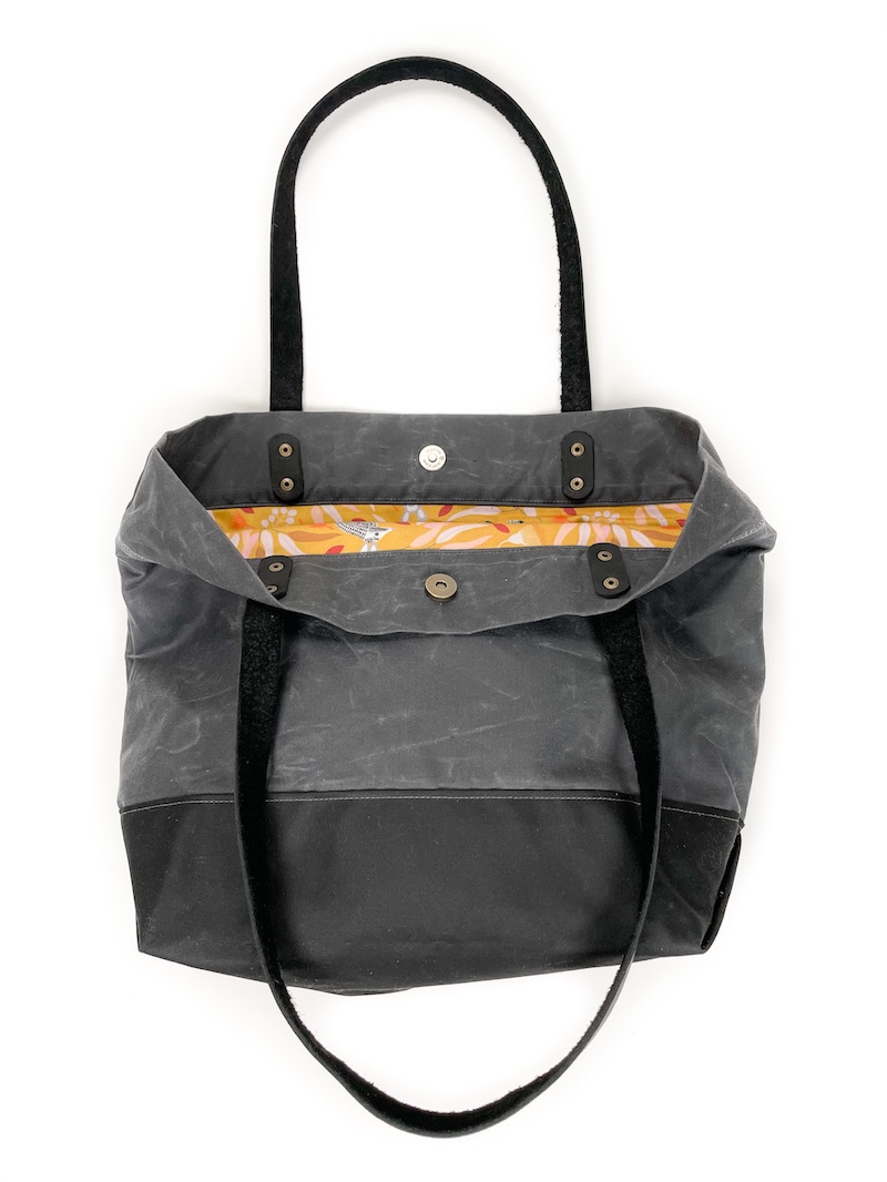 Grey tote bag slightly open